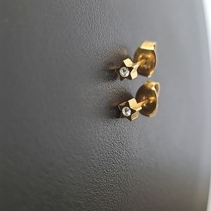 Vintage gold tone star earrings with chip cubic zirconia stone on stud backing